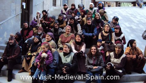 Participants in the Medieval Fair of Manresa 201 taking a well deserved break. Manresa, Catalonia, Spain
